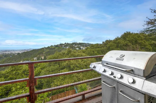 a view of a balcony with an outdoor space
