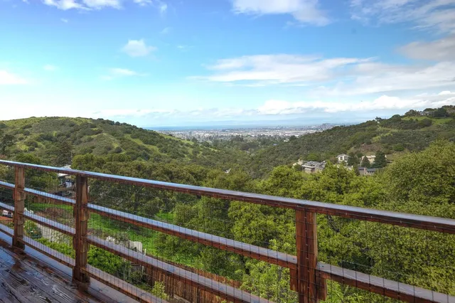 a view of a mountain from a balcony