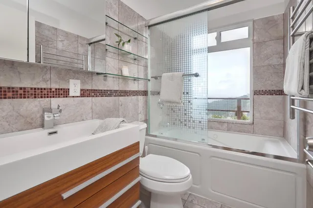 a bathroom with a sink and a bathtub