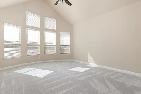 a view of empty room with windows