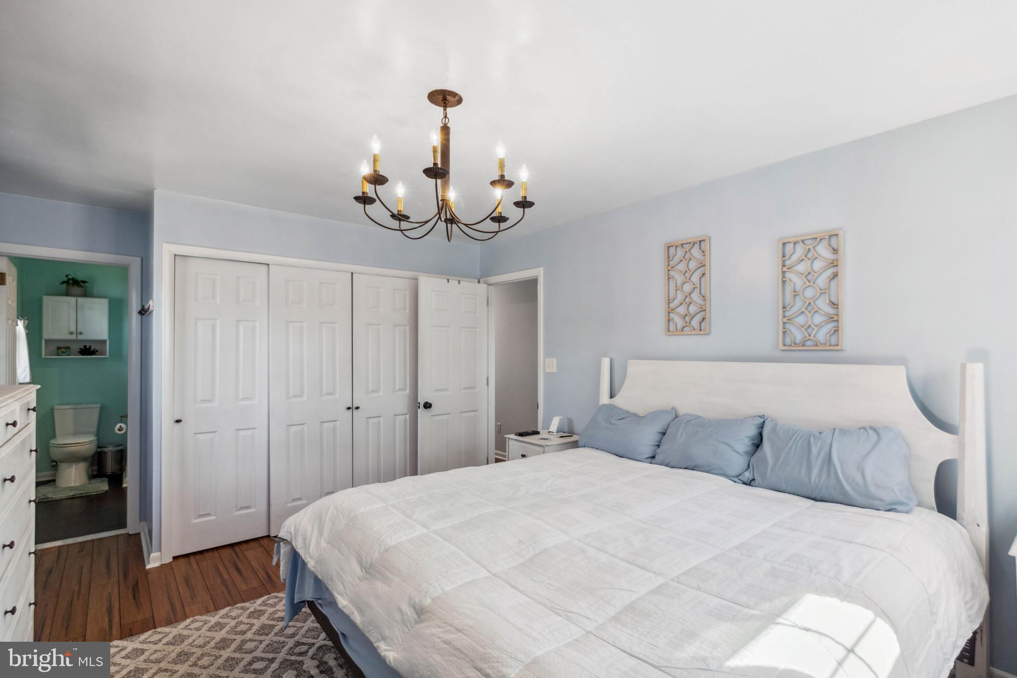 32568 Hastings Drive Laurel, DE 19956 - Photo 13 of 43 a bedroom with a bed and wooden floor