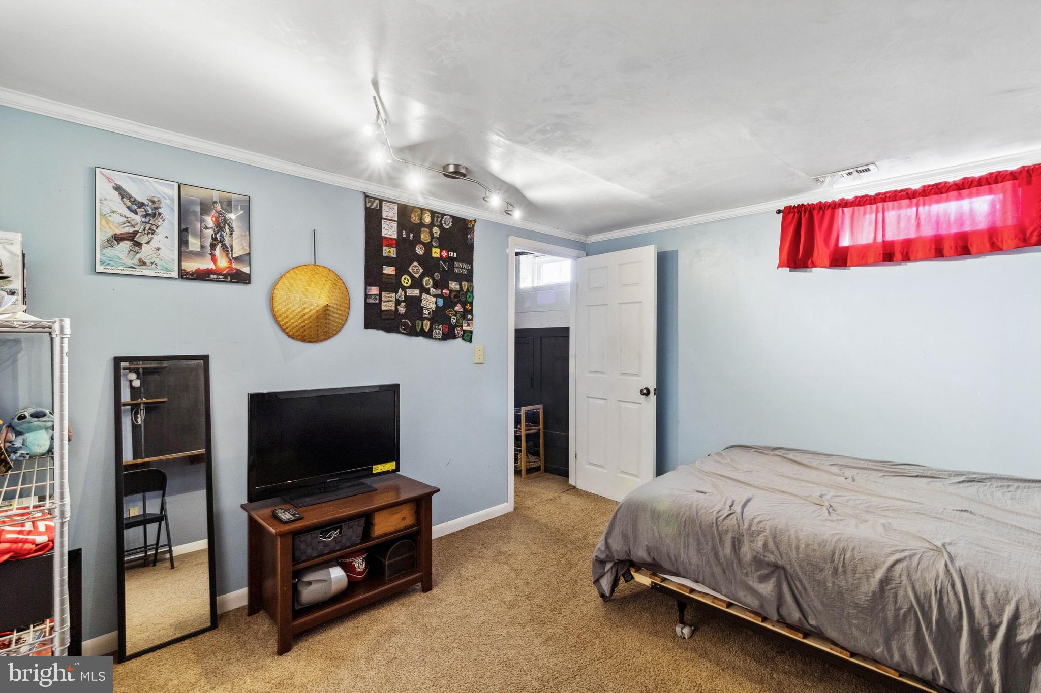 32568 Hastings Drive Laurel, DE 19956 - Photo 25 of 43 a spacious bedroom with a bed and a flat screen tv
