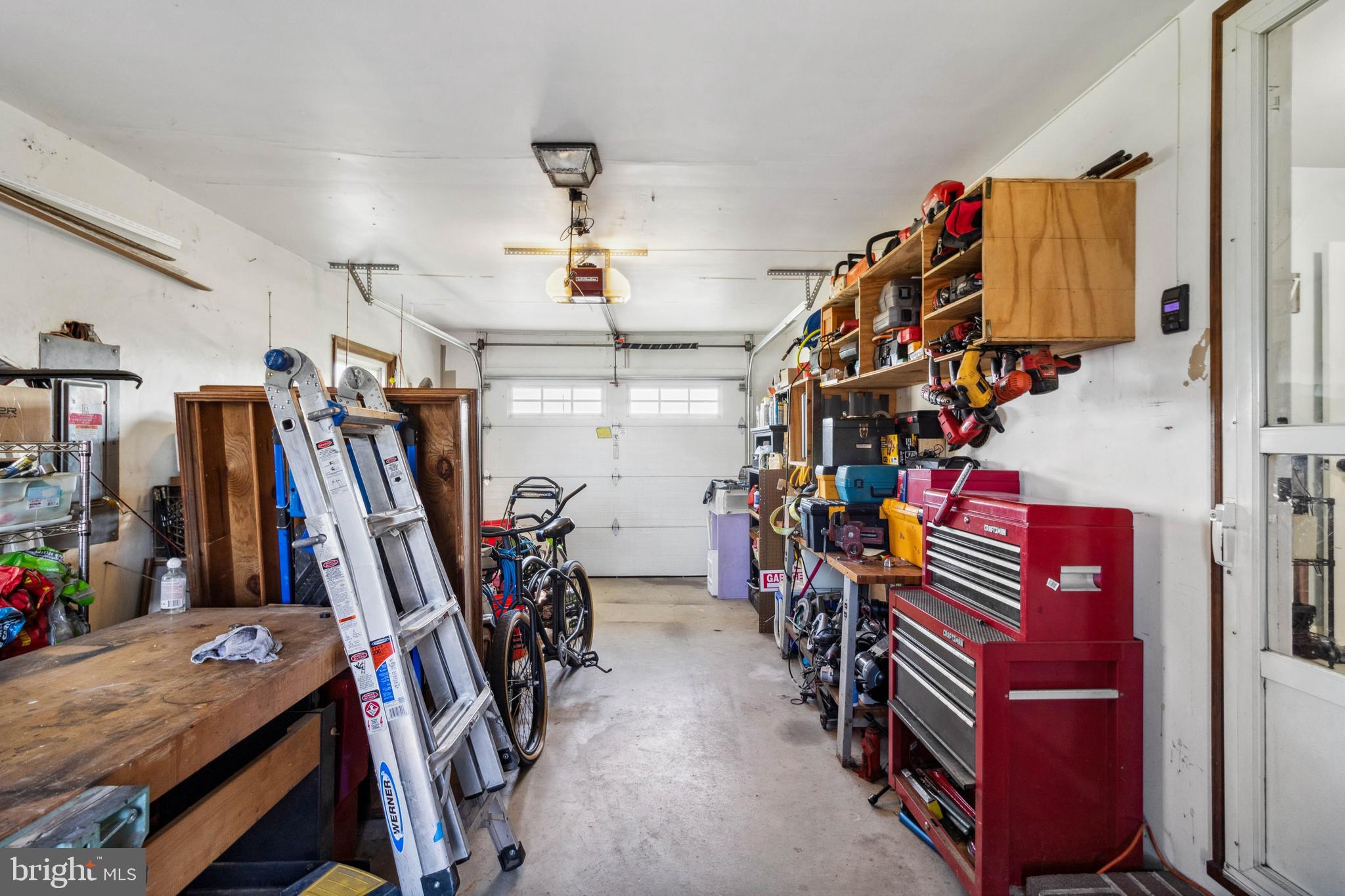 32568 Hastings Drive Laurel, DE 19956 - Photo 26 of 43 a view of walk in closet with clothes