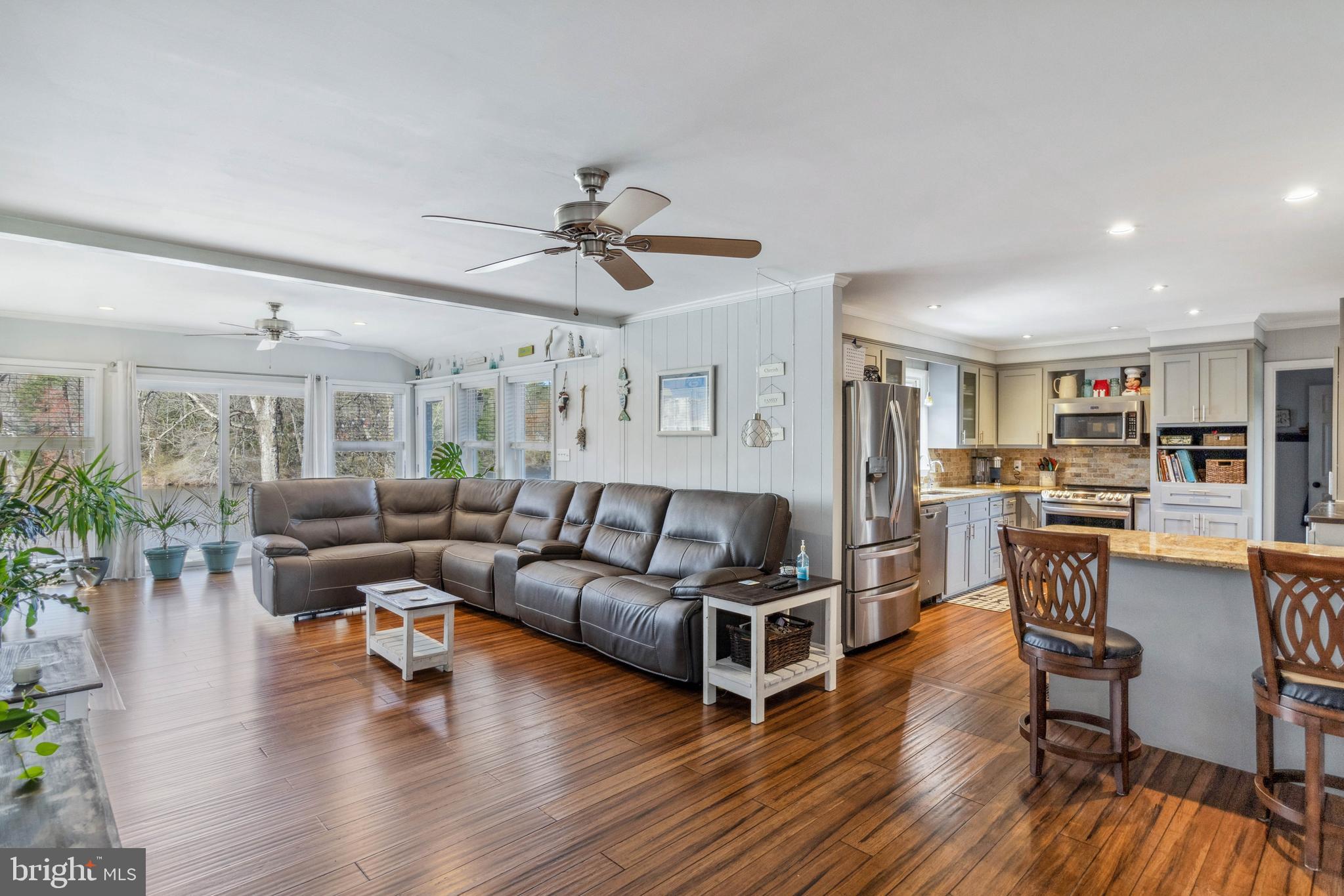 32568 Hastings Drive Laurel, DE 19956 - Photo 3 of 43 a living room with furniture and a wooden floor