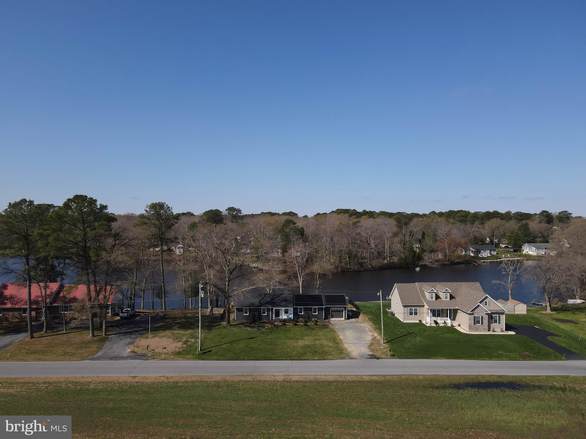 32568 Hastings Drive Laurel, DE 19956 - Photo 32 of 43 a view of a lake with houses