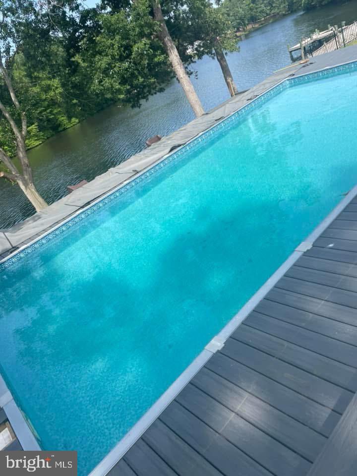 32568 Hastings Drive Laurel, DE 19956 - Photo 40 of 43 a view of a yard with wooden floor and lake view