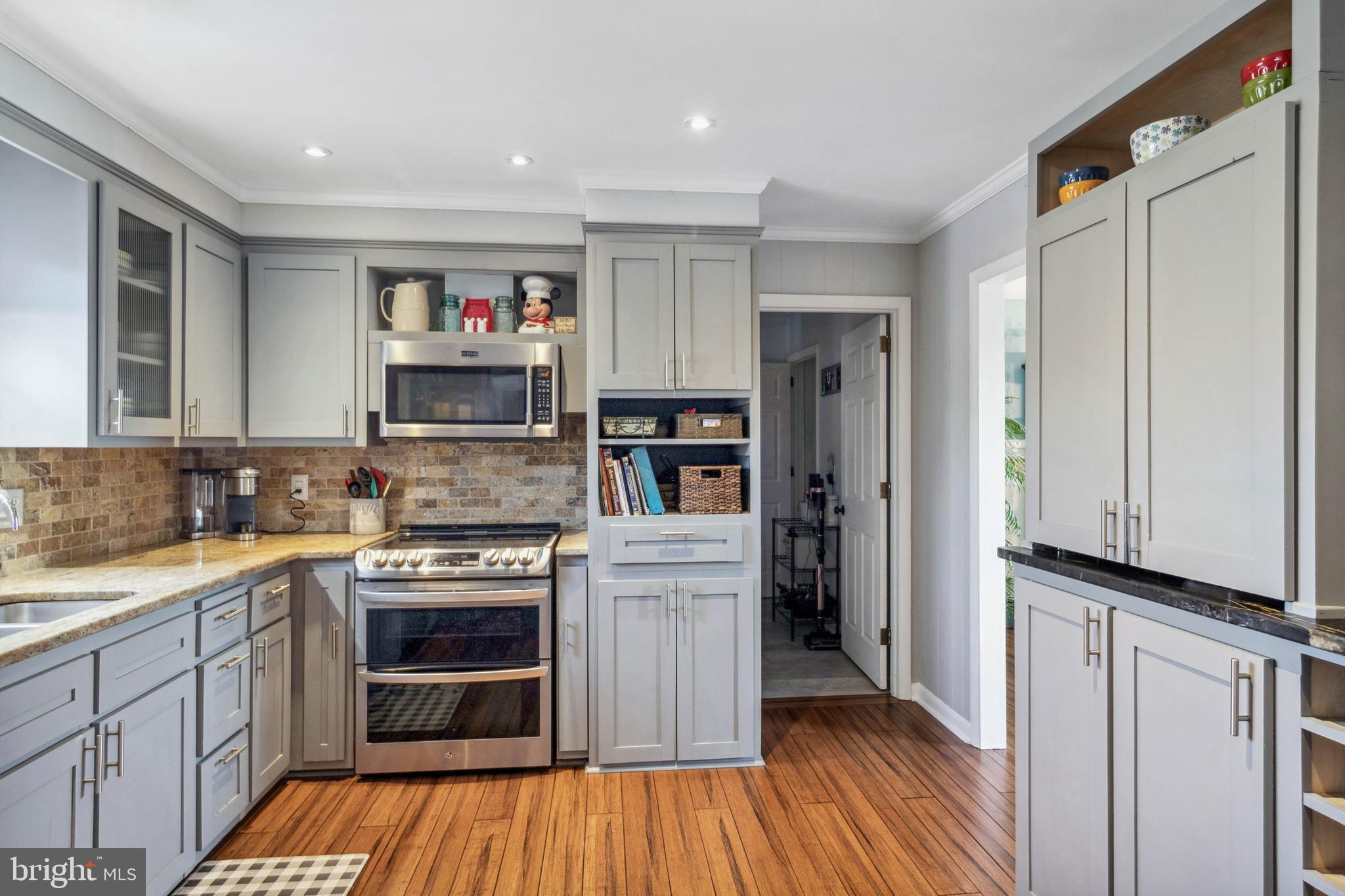 32568 Hastings Drive Laurel, DE 19956 - Photo 7 of 43 a kitchen with stainless steel appliances a stove and a refrigerator