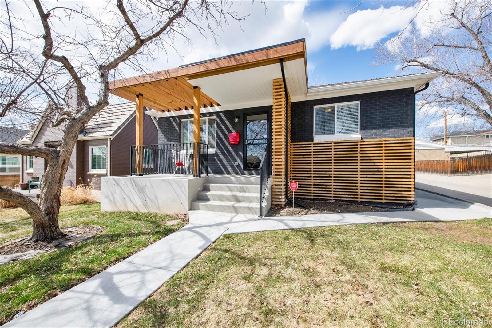 2745 King Street Denver, CO 80211 - Photo 1 of 24 a view of a house with a yard