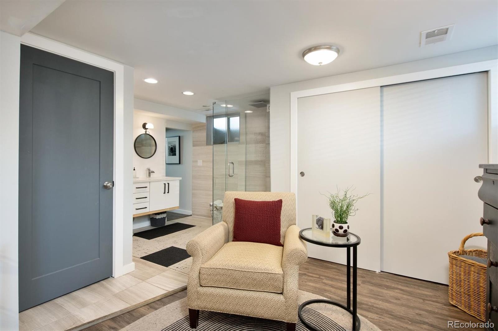 2745 King Street Denver, CO 80211 - Photo 17 of 24 a living room with furniture and a rug