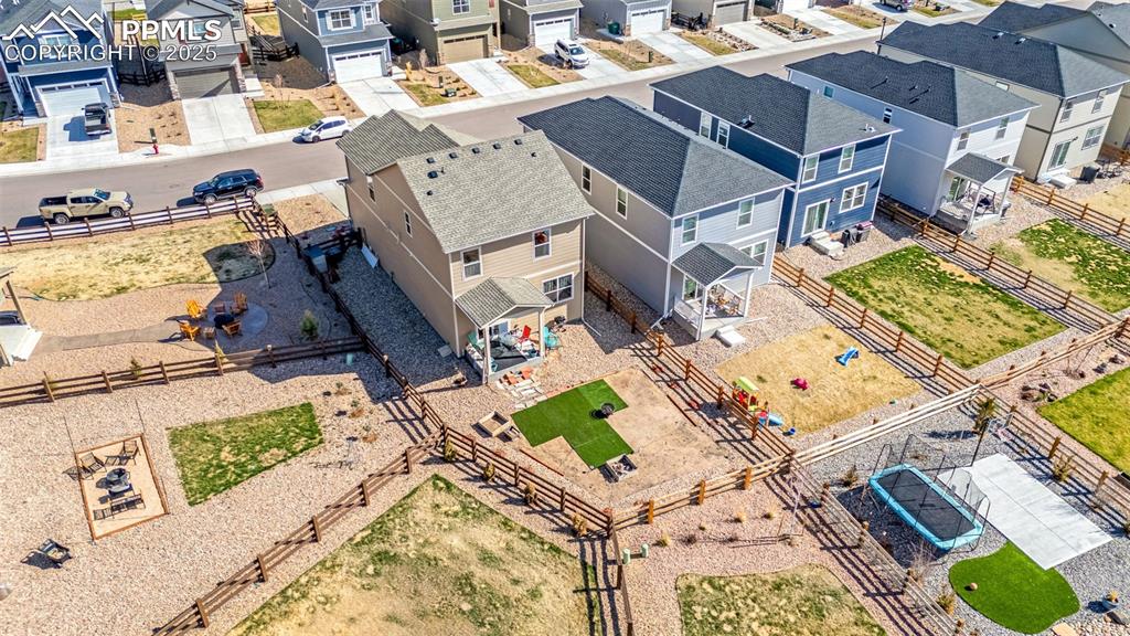 2325 Coyote Mint Drive Monument, CO 80132 - Photo 20 of 26 an aerial view of a house with a yard