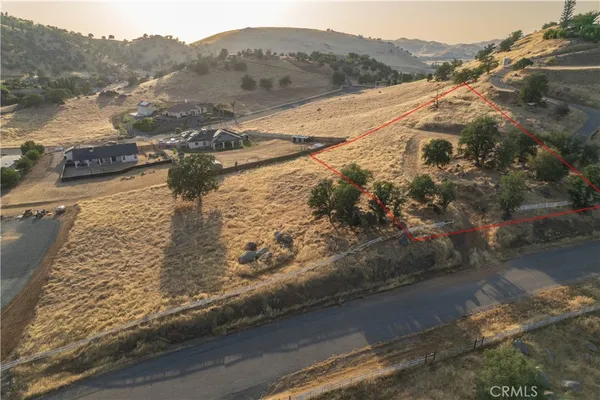 a view of a backyard of a house