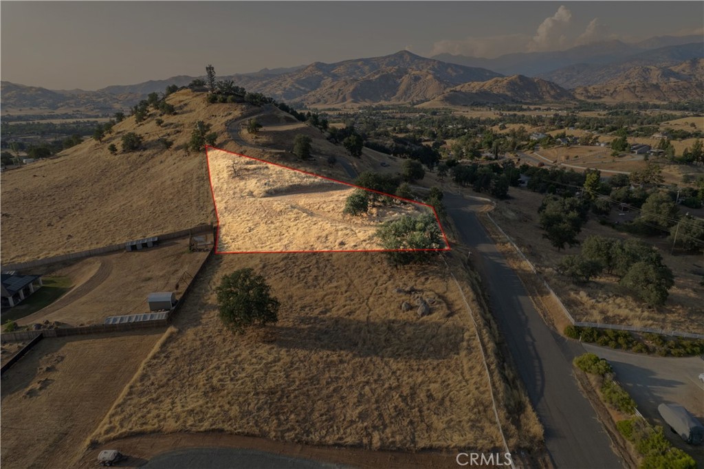 16295 Wrangler Drive Springville, CA 93265 - Photo 9 of 9 a view of a house with a yard