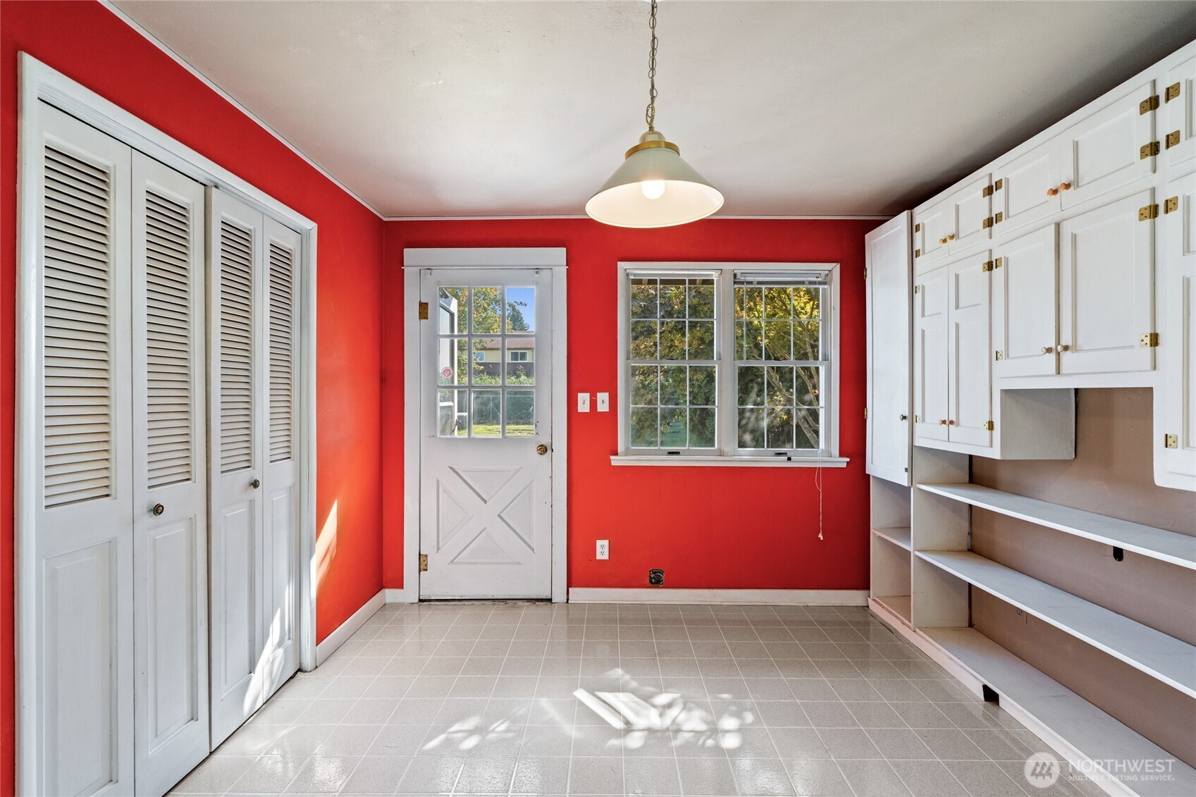 1118 Thompson Street Sumner, WA 98390 - Photo 18 of 39 a view of room with window and chandelier