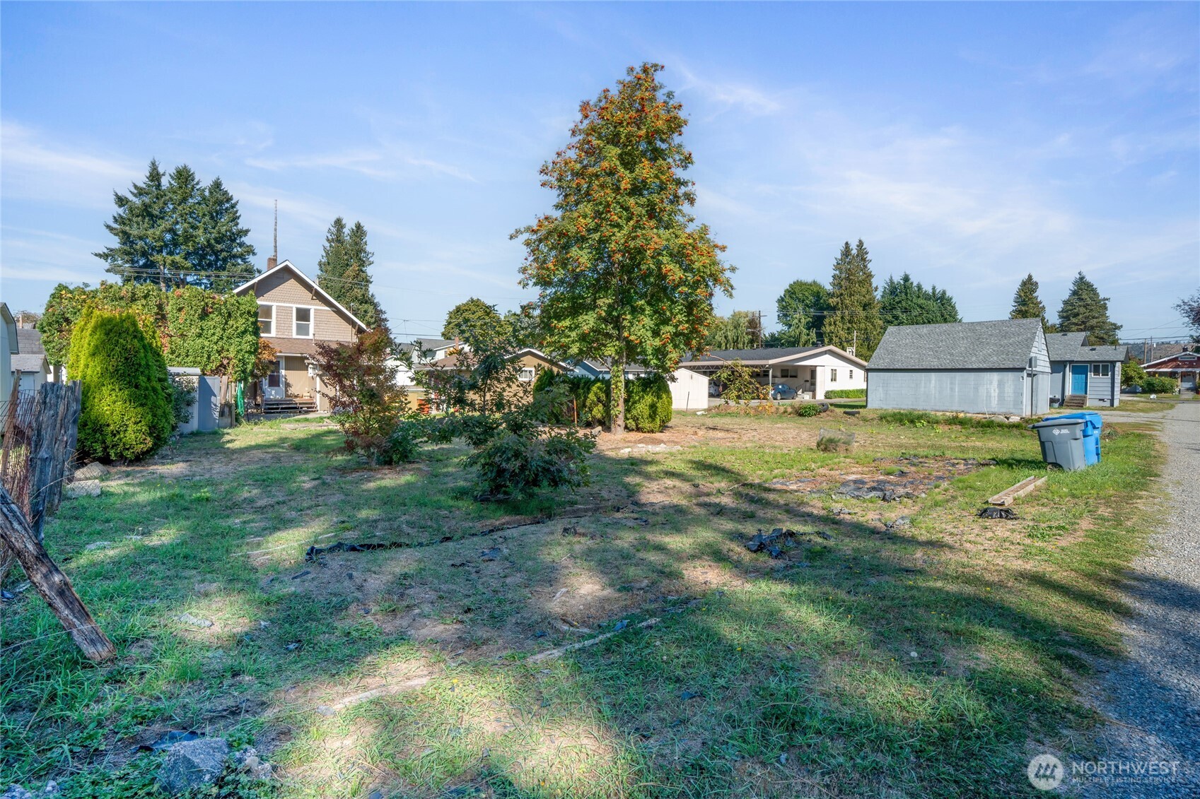 1118 Thompson Street Sumner, WA 98390 - Photo 30 of 39 a view of a house with a yard
