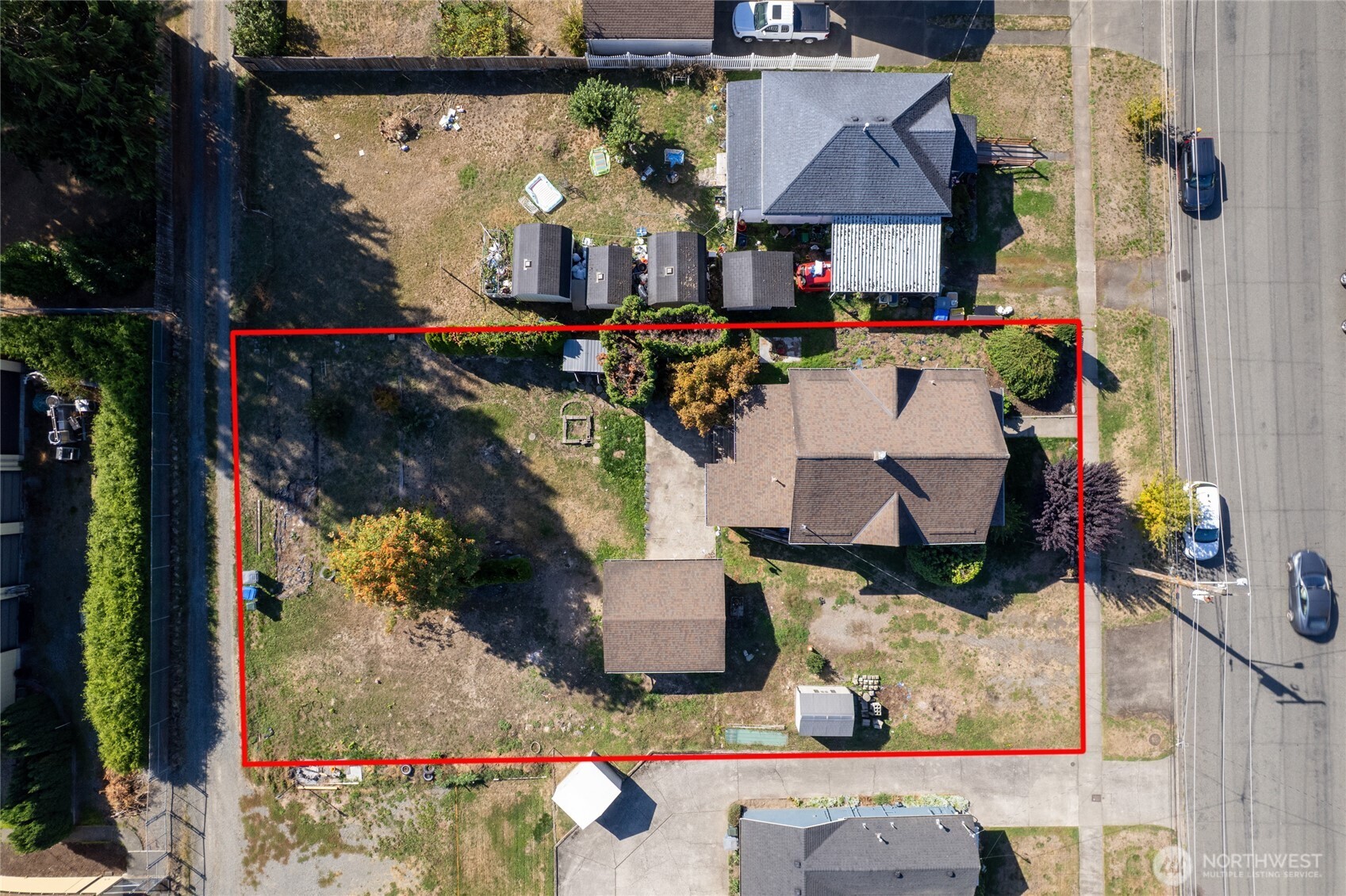 1118 Thompson Street Sumner, WA 98390 - Photo 33 of 39 an aerial view of houses with outdoor space