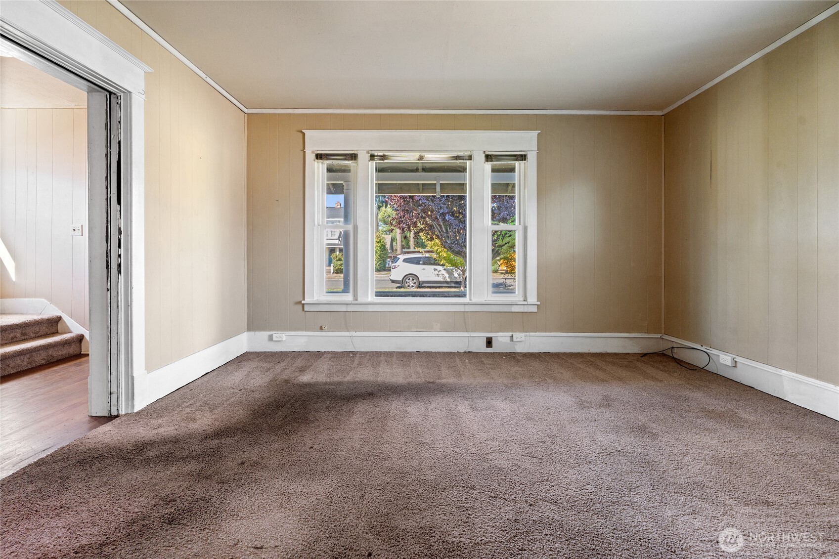 1118 Thompson Street Sumner, WA 98390 - Photo 9 of 39 a view of an empty room with a window