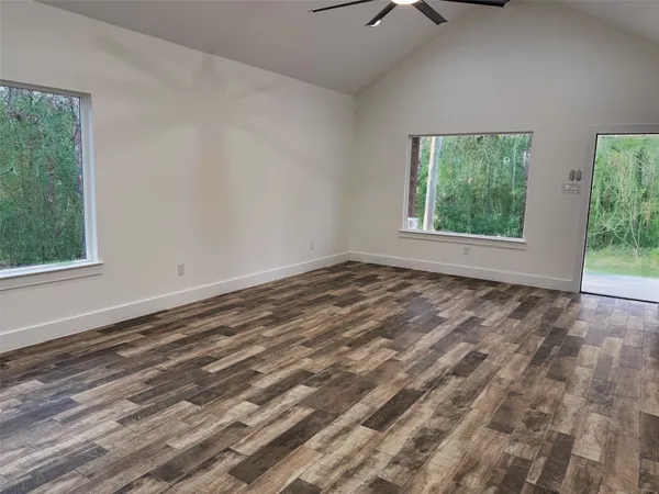 a kitchen with a sink a stove and cabinets