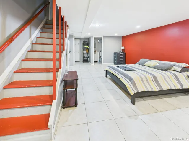 a bedroom with a bed and walk in closet