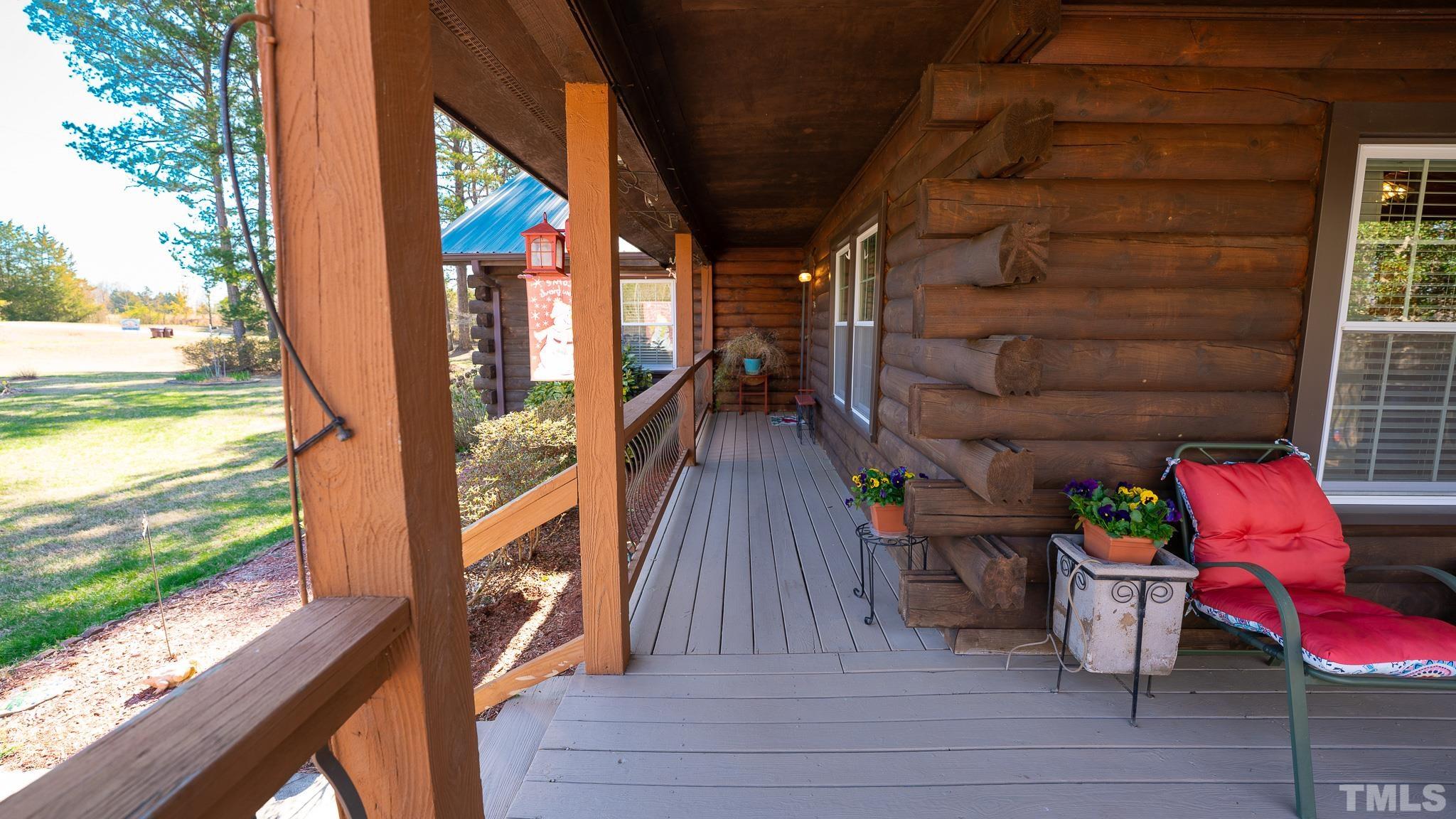 714 Lucy Garrett Road Roxboro, NC 27574 - Photo 59 of 68 a view of outdoor space and deck
