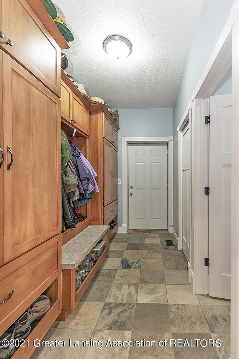 4890 Nichols Road Mason, MI 48854 - Photo 26 of 45 Garage entry built-ins