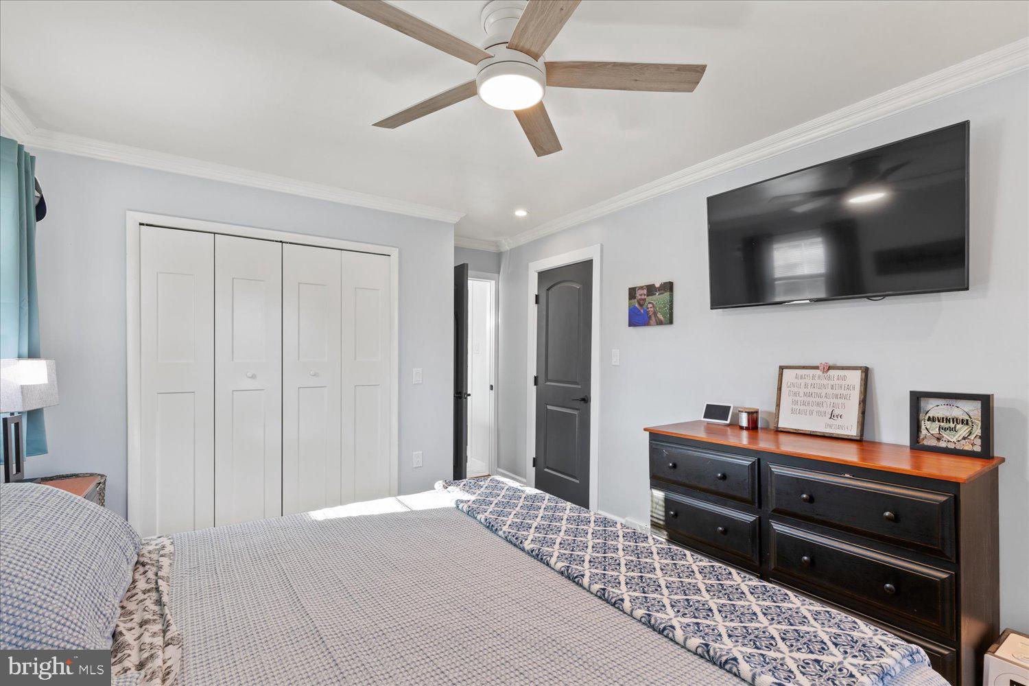 45 Heritage Road Akron, PA 17501 - Photo 17 of 56 a bedroom with a bed and a flat screen tv