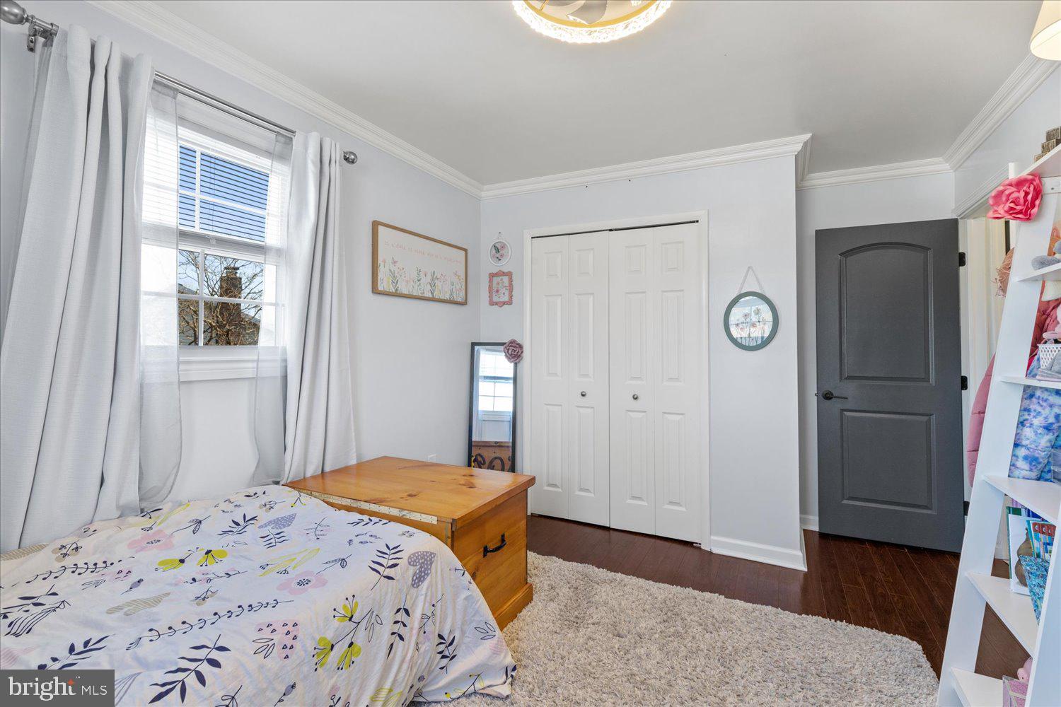 45 Heritage Road Akron, PA 17501 - Photo 19 of 56 a bedroom with a bed and a window