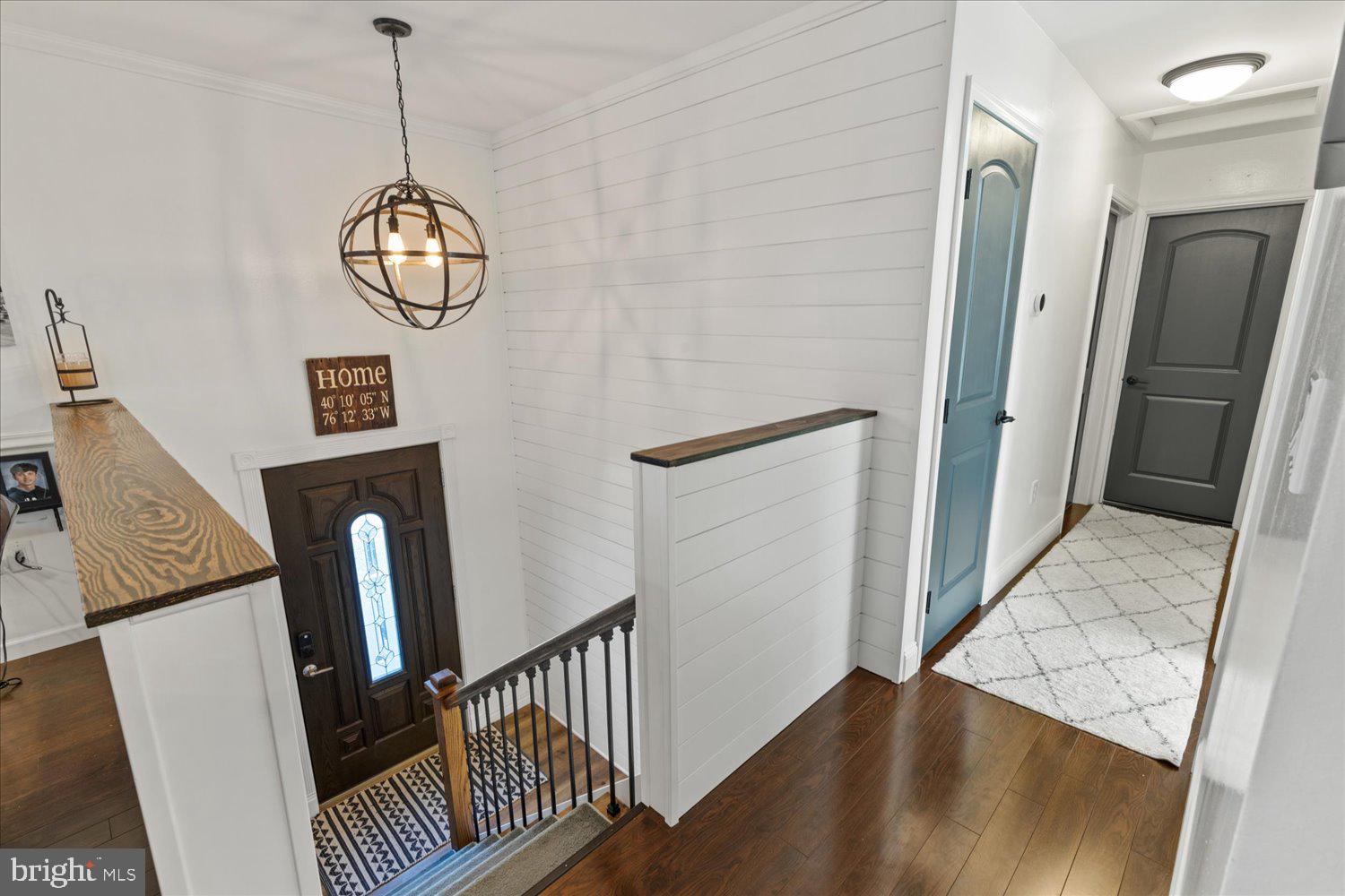 45 Heritage Road Akron, PA 17501 - Photo 23 of 56 a view of a hallway with wooden floor and staircase