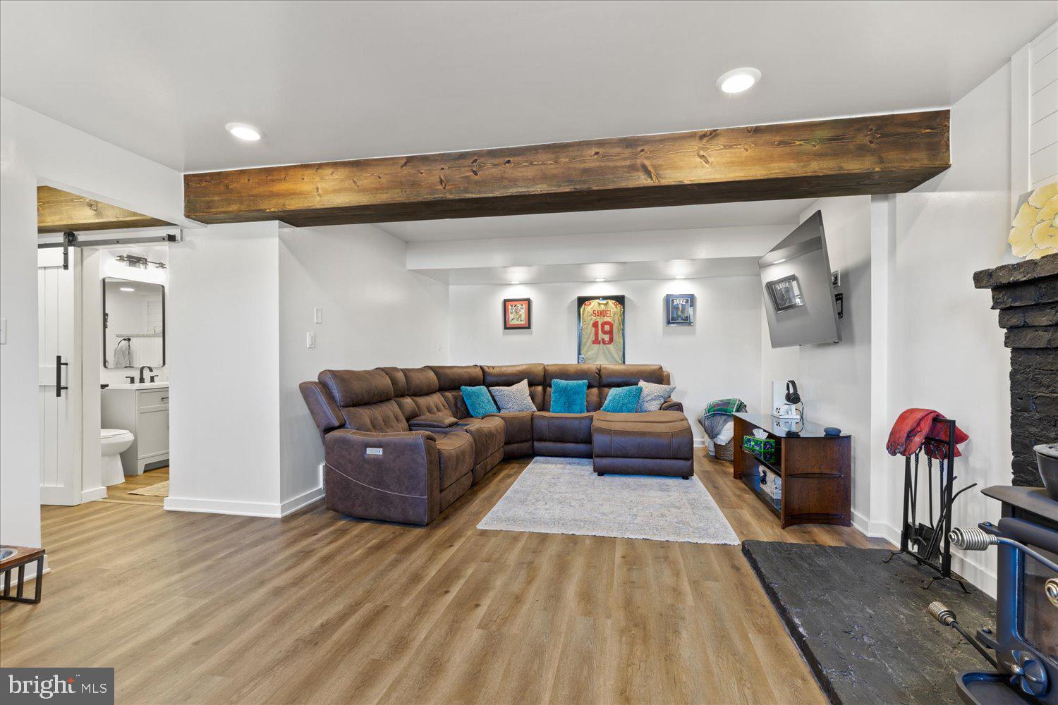 45 Heritage Road Akron, PA 17501 - Photo 29 of 56 a living room with furniture and wooden floor