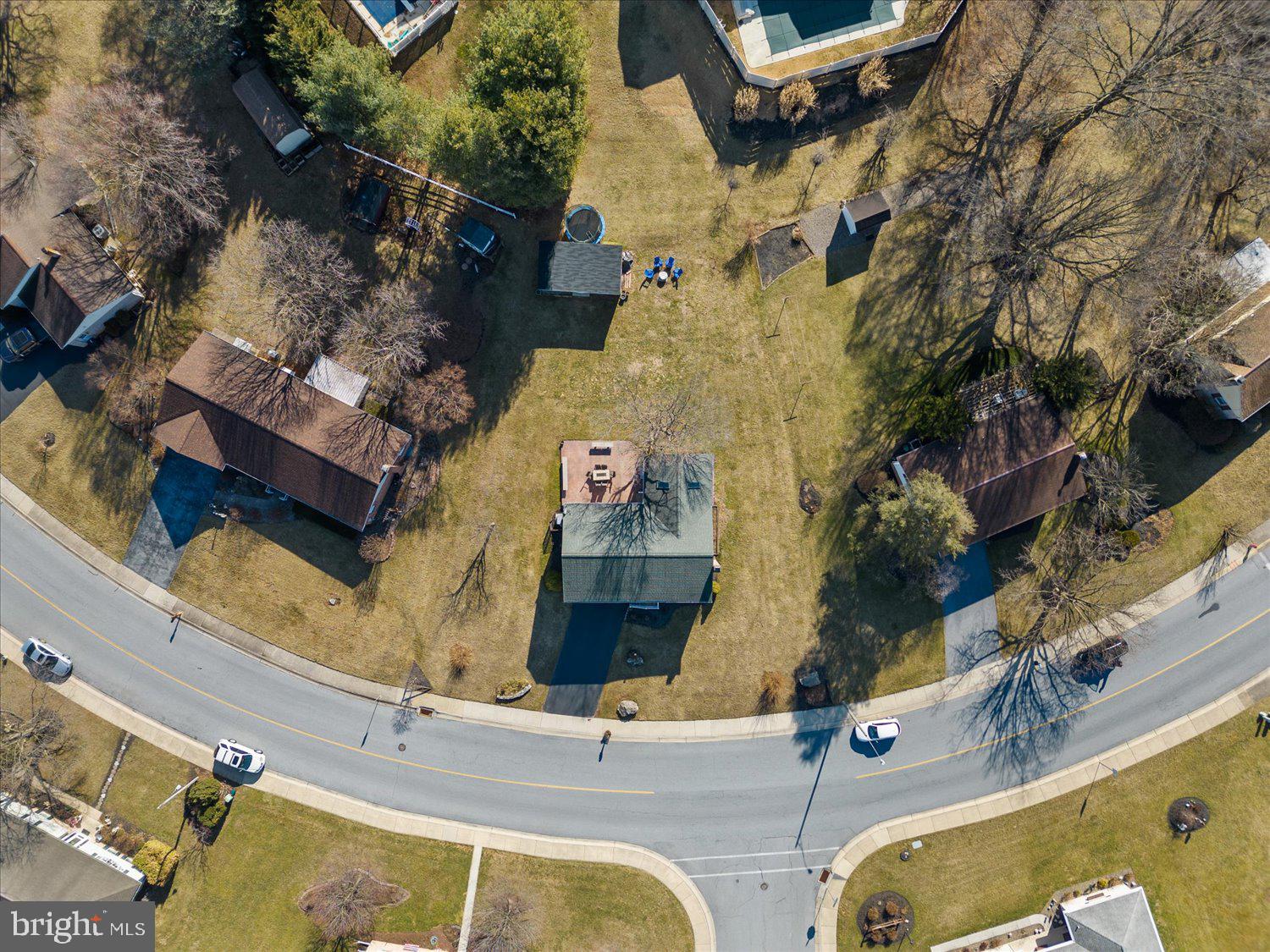 45 Heritage Road Akron, PA 17501 - Photo 47 of 56 an aerial view of a house with a swimming pool