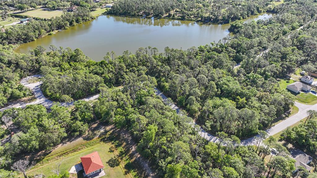 Longwell Ln Port North Port, FL 34286 - Photo 11 of 13 an aerial view of residential house with outdoor space and lake view