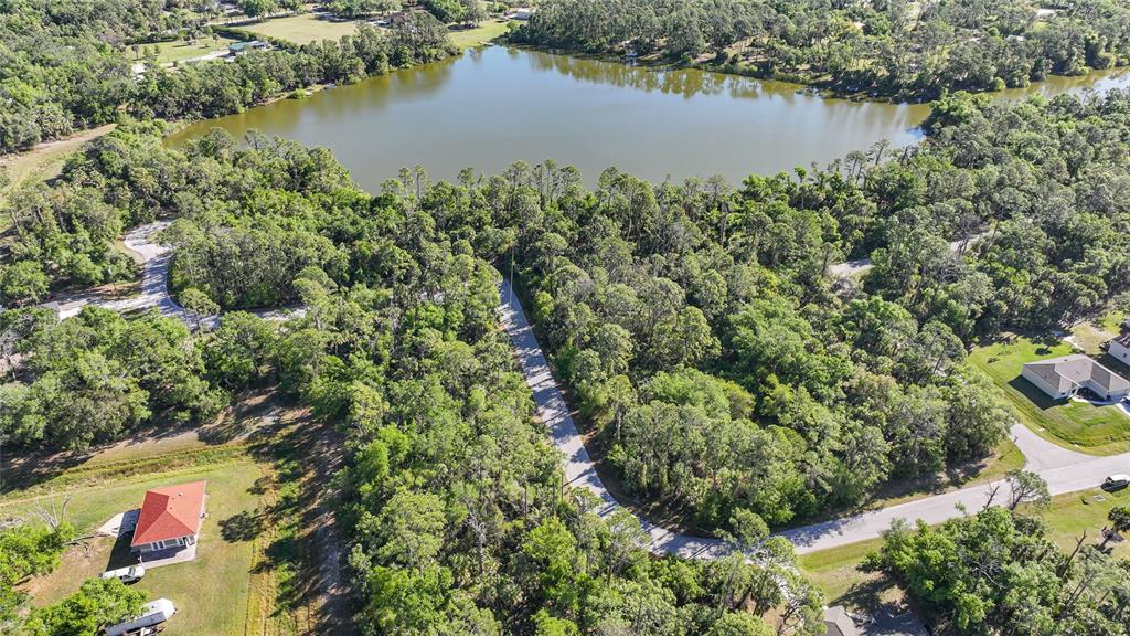 Longwell Ln Port North Port, FL 34286 - Photo 12 of 13 an aerial view of residential house with outdoor space and lake view