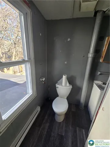 a bathroom with a toilet