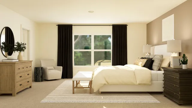 a bedroom with a large bed and a window