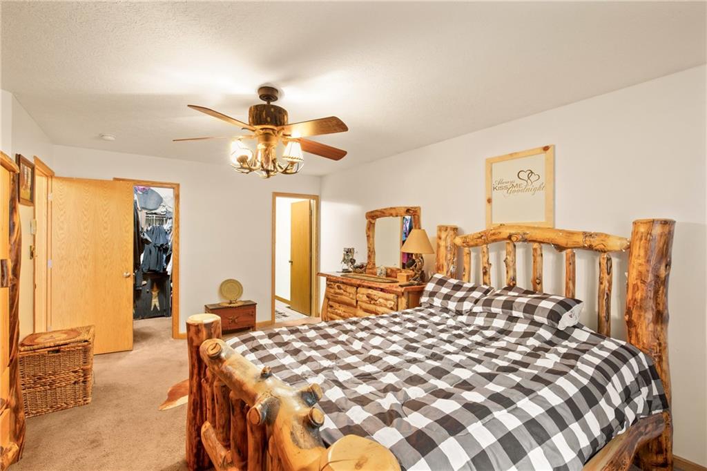 5164 Lincoln Highway Stoystown, PA 15563 - Photo 14 of 50 a bedroom with a bed and wooden floor