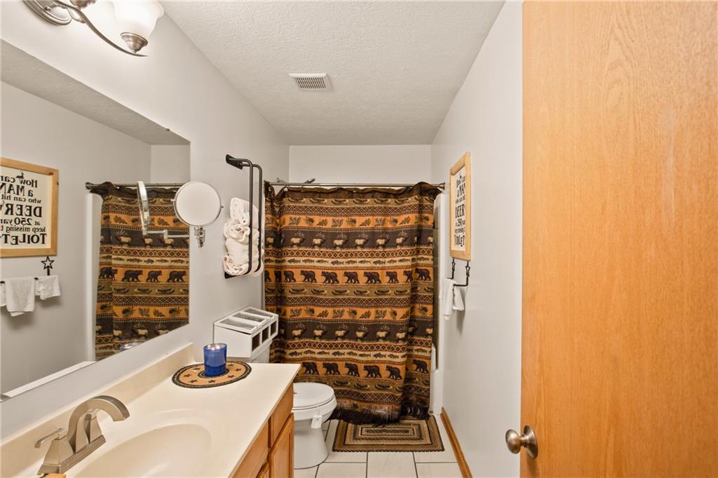 5164 Lincoln Highway Stoystown, PA 15563 - Photo 15 of 50 a bathroom with a bathtub and shower