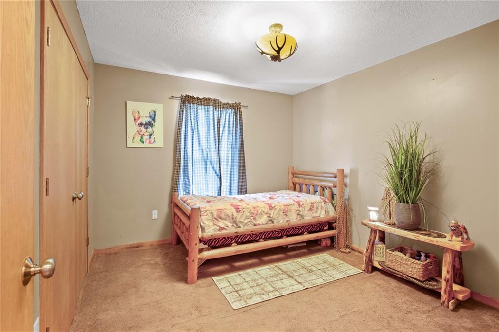 5164 Lincoln Highway Stoystown, PA 15563 - Photo 18 of 50 a bedroom with a bed and a window