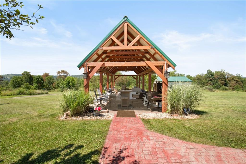 5164 Lincoln Highway Stoystown, PA 15563 - Photo 30 of 50 a view of a house with a yard