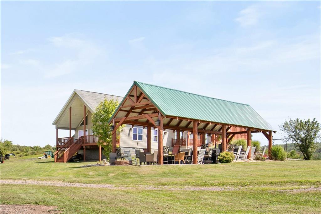 5164 Lincoln Highway Stoystown, PA 15563 - Photo 32 of 50 a view of a house with a yard and sitting area
