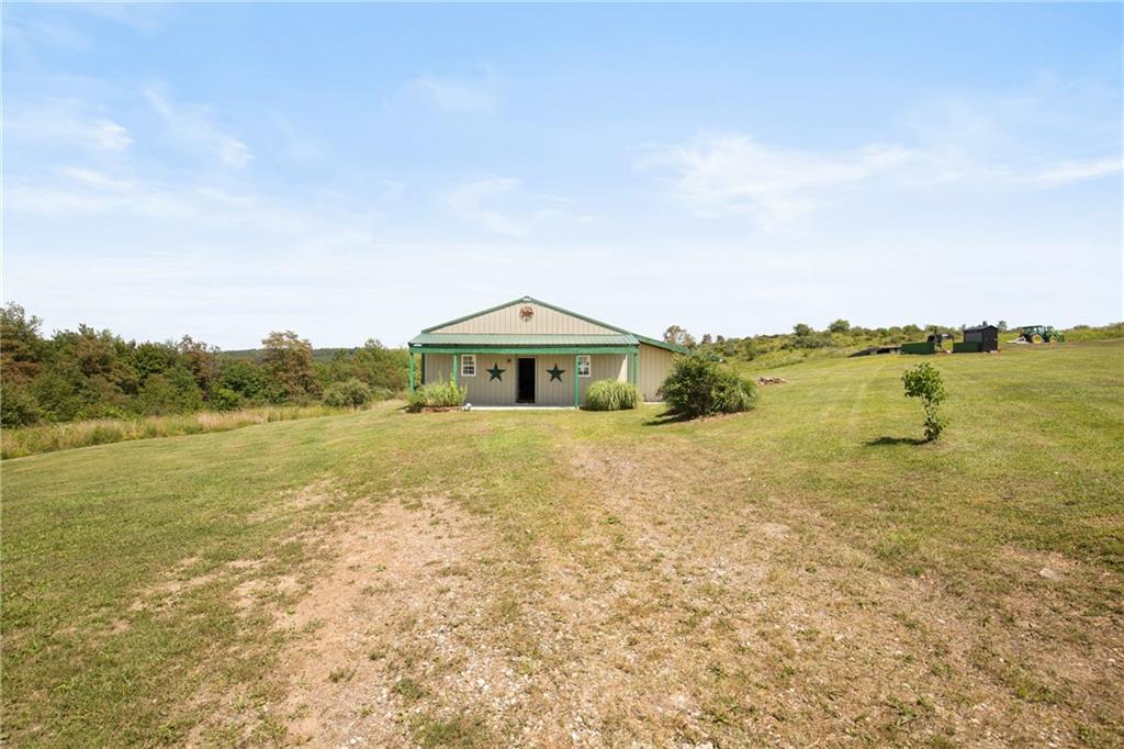 5164 Lincoln Highway Stoystown, PA 15563 - Photo 35 of 50 a front view of a house with a yard