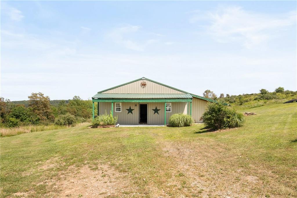 5164 Lincoln Highway Stoystown, PA 15563 - Photo 36 of 50 a view of a house with a yard