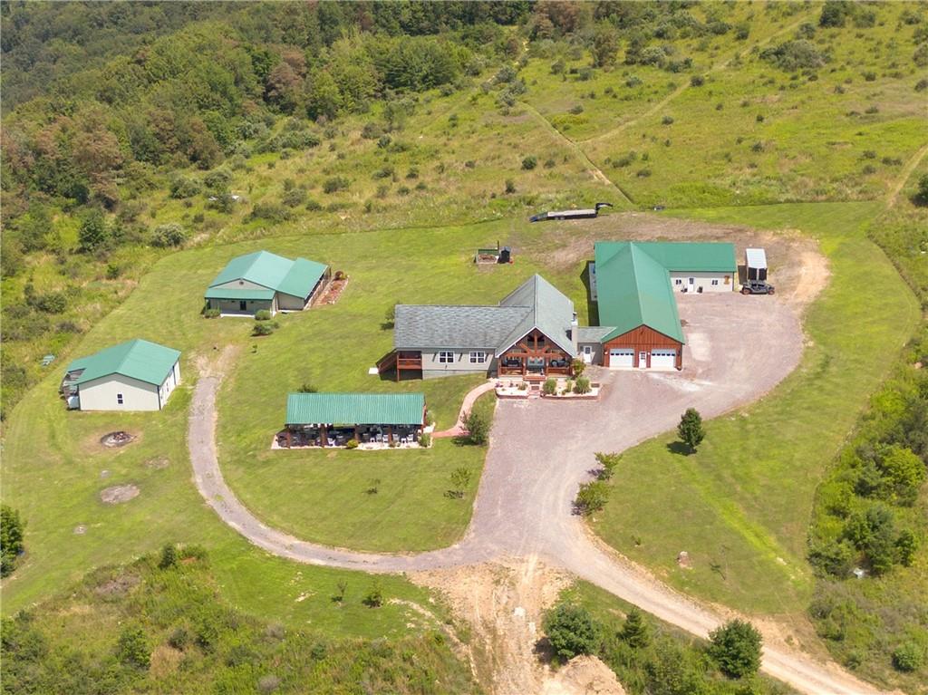 5164 Lincoln Highway Stoystown, PA 15563 - Photo 45 of 50 an aerial view of a house with a swimming pool