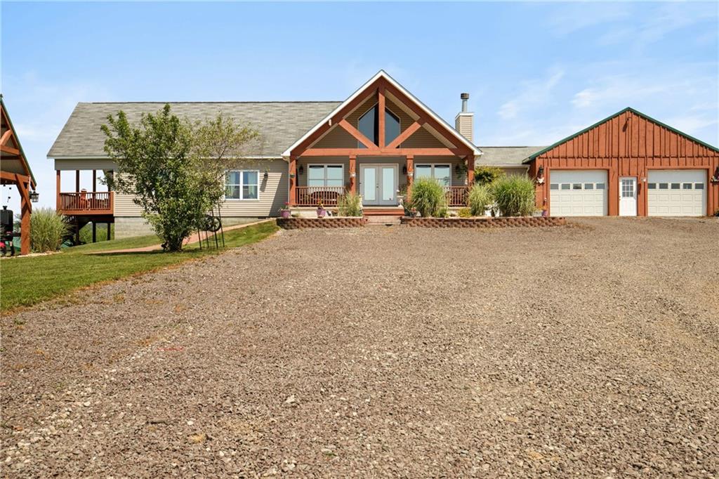 5164 Lincoln Highway Stoystown, PA 15563 - Photo 5 of 50 a front view of a house with a yard and garage
