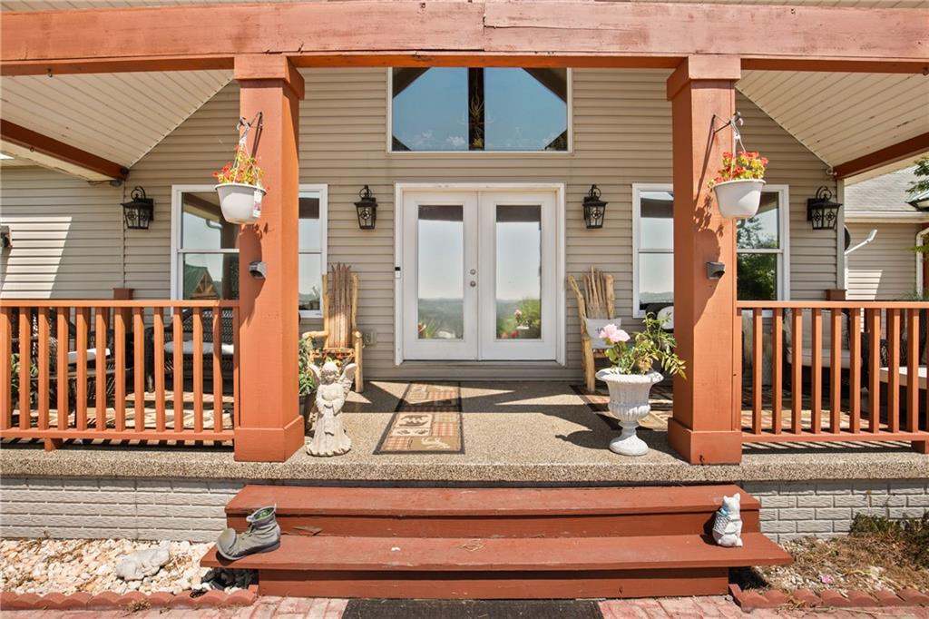 5164 Lincoln Highway Stoystown, PA 15563 - Photo 6 of 50 front view of a house with a porch