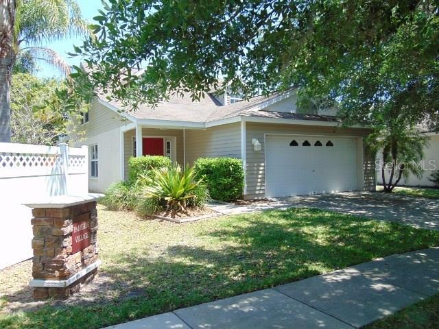 5705 Tanagergrove Way Lithia, FL 33547 - Photo 1 of 1 a view of a house with a yard