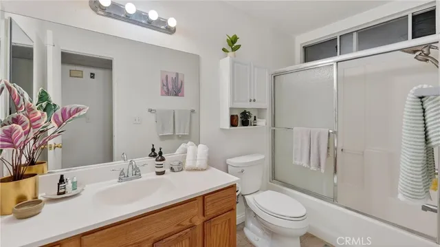 a view of a balcony with a pot