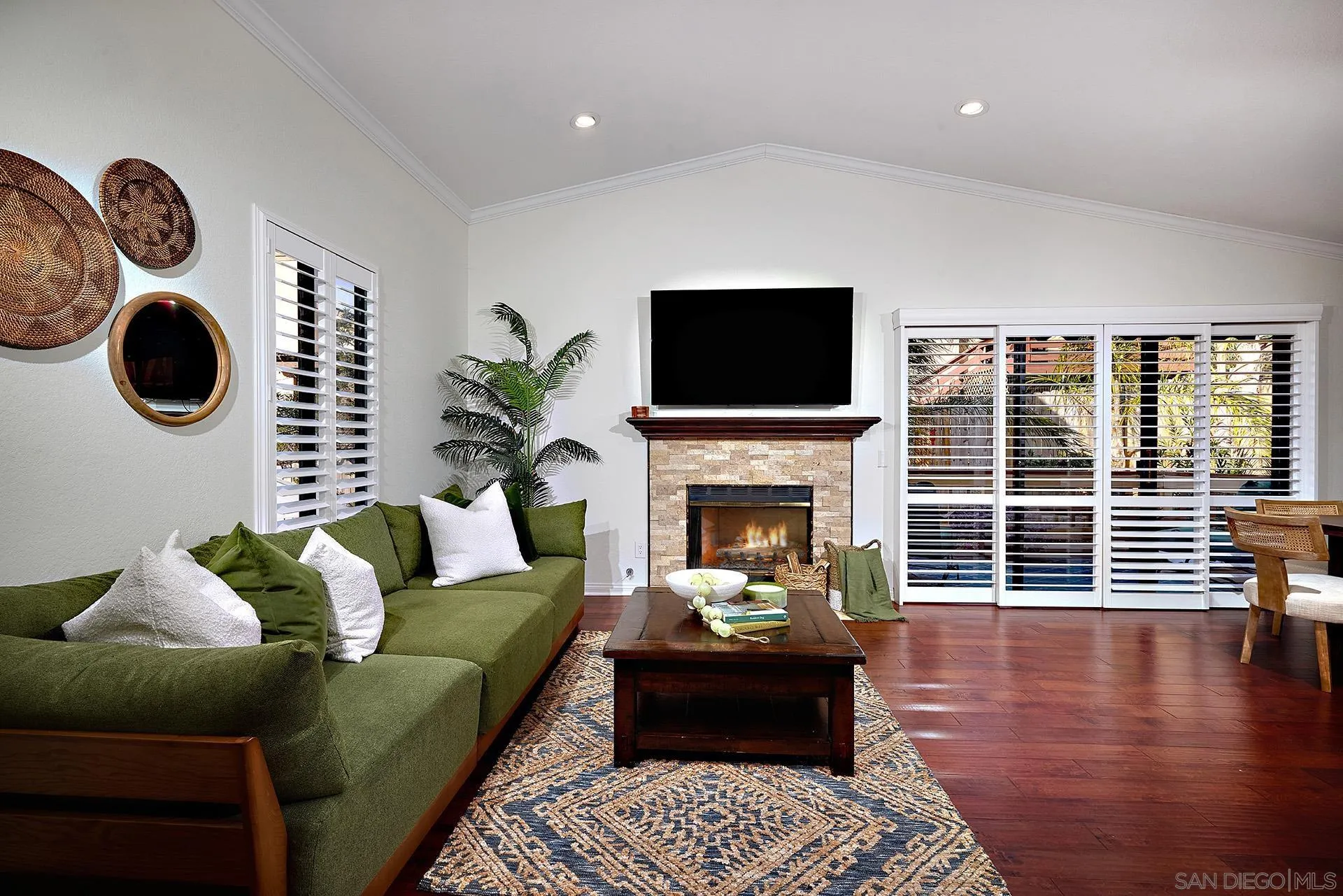 1960 Maverick Glen Escondido, CA 92027 - Photo 11 of 45 a living room with furniture a fireplace and a floor to ceiling window