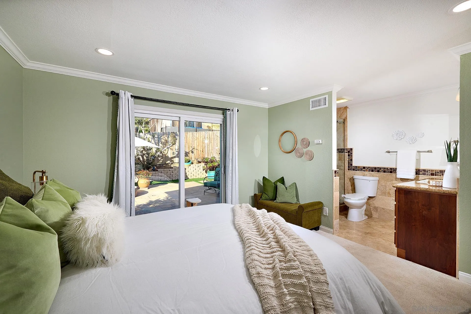 1960 Maverick Glen Escondido, CA 92027 - Photo 24 of 45 a bedroom with a bed and large windows