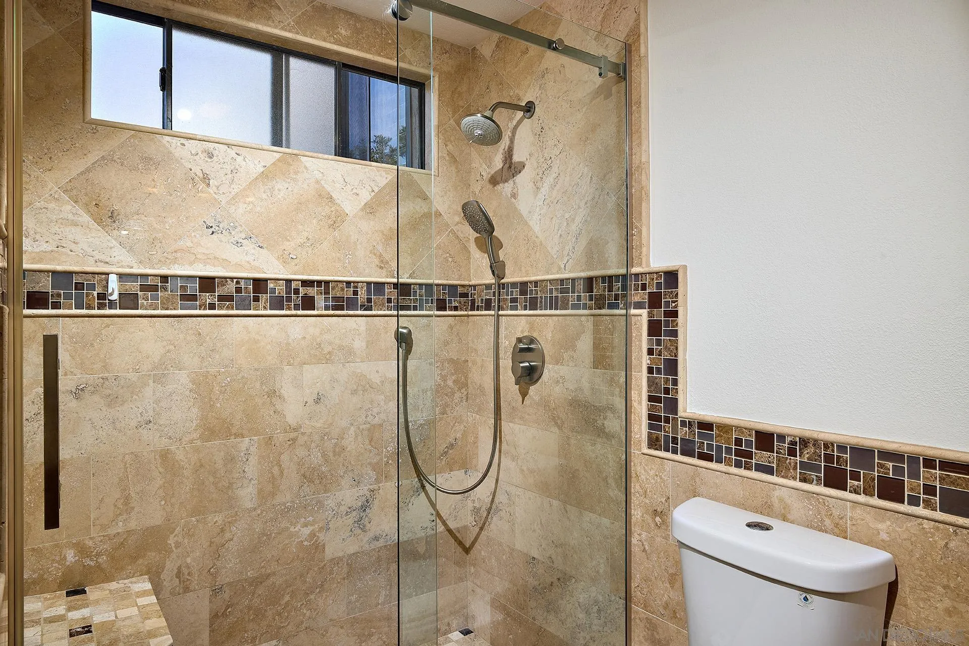 1960 Maverick Glen Escondido, CA 92027 - Photo 26 of 45 a bathroom with a shower and a toilet