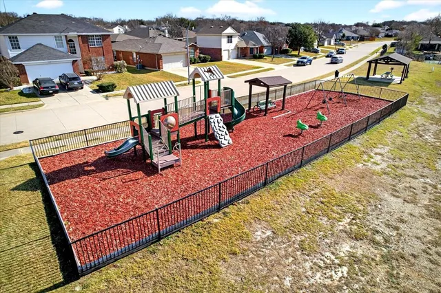 a view of a swimming pool with a lounge chair