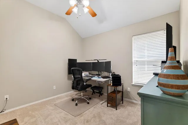 a workspace with furniture and a window